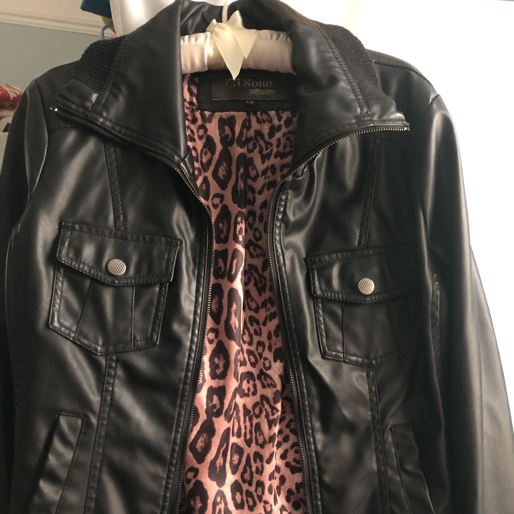 Black Leather jacket with Front pockets.
